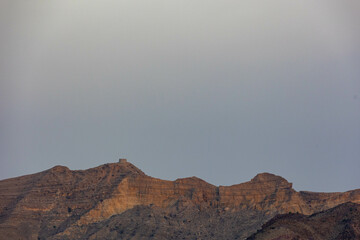 Majestic desert mountain under overcast sky, Ranikot, Sindh, Pakistan