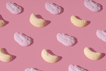 Shrimp/Prawn and Banana Candy on a Pink Background