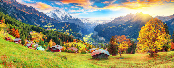 Fabulous autumn view of picturesque alpine Wengen village and Lauterbrunnen Valley - obrazy, fototapety, plakaty