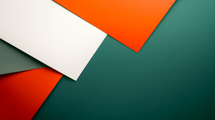 Abstract paper card background with geometric shapes in white, orange and dark green colors.
