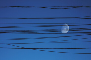 Full moon evening sky evening skylight sky. electricity technology equipment landscape cable wire....