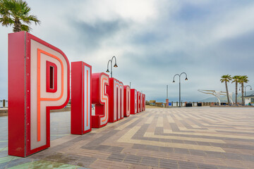 Pismo Beach Pier plaza. The large light-up letters, landmark of Pismo Beach city, California