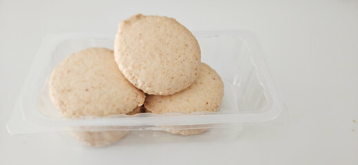 Gluten free coconut cookies in a package on an isolated background 