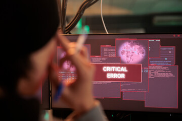 Critical error alert on computer screen, unsuccessful system hacking, cyberattack. Encryption...