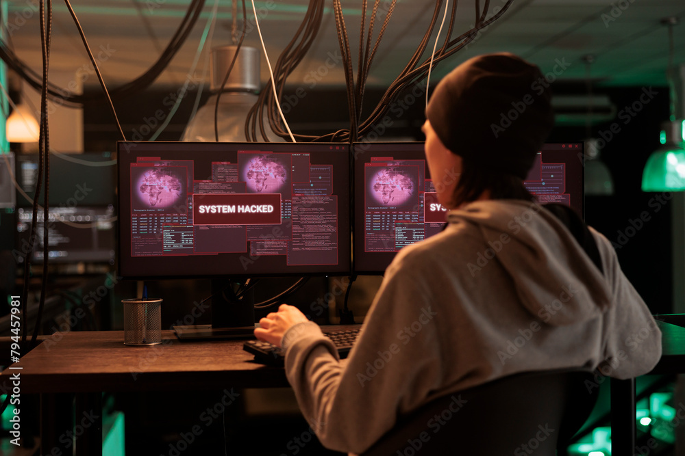 Aufkleber encryption specialist looking at alert message to hack system, trying to break into computer server 