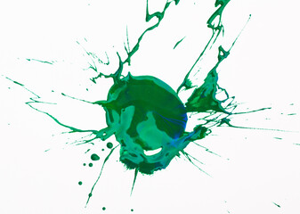 Spilled green paint spot on paper, colorfull artistic image on white background