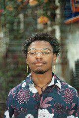 portrait of black man double exposure with street art