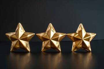 Three gold 3D stars on a black background