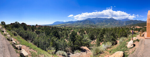 Panoramic view of the mountains including Pikes Peak in the Valley of the Gods Park in Colorado Springs, Colorado.