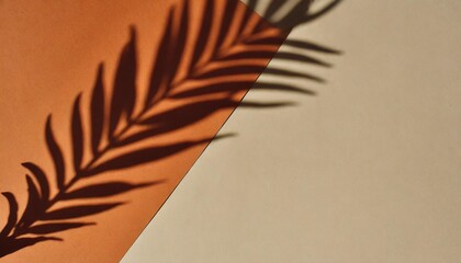 warm summer color background with tropical palm leaf shadow vibrant orange and beige paper texture...