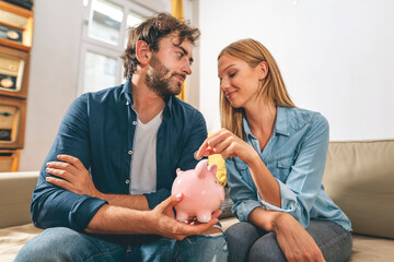 Young couple is saving money for their new home