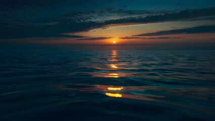 Fototapeta na wymiar Calming sea at night time