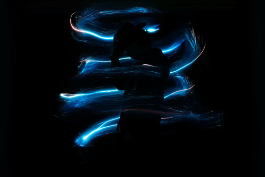 silhouette of a man cast in contalus