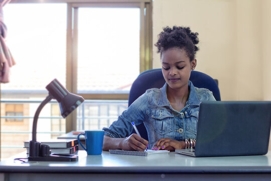 Woman taking notes