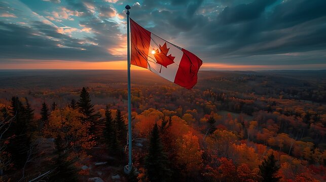 A majestic Canadian flag waves proudly above a vibrant autumn forest at sunset, symbolizing national pride and natural beauty. 