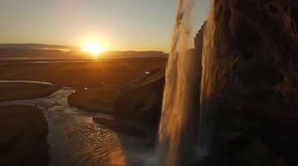 view of the waterfall at sunset