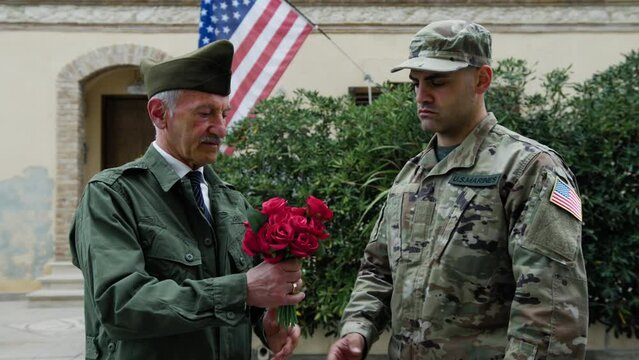 Soldier Donates Flowers To The General In Gratitude For His Service Offered