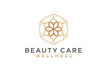 Golden color mandala pattern logo design for spa and beauty brand identity.