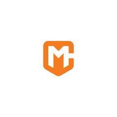 MC monogram logo in shield shape.