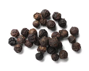 Fotobehang Aromatic spice. Many black dry peppercorns isolated on white, top view © New Africa