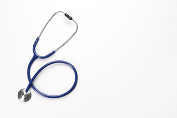 New stethoscope on white background, top view. Medical instrument