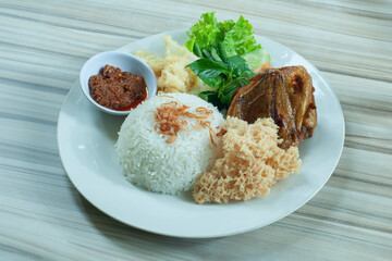 Nasi Bebek Kremes or Crunchy fried duck