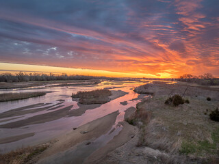 springtime sunrise over Platte River and plains near Kerney, Nebraska - 794583723