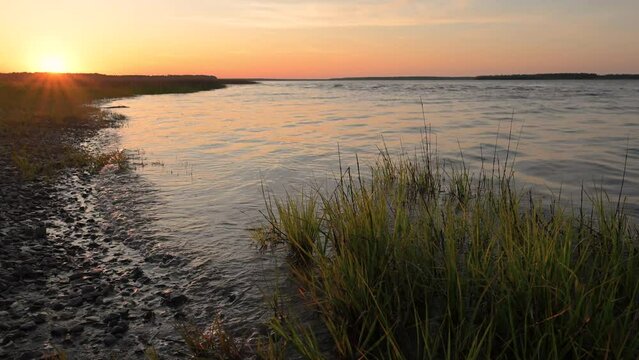Coastal sunset with waves and audio