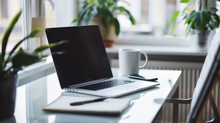 A minimalist workspace with a sleek, uncluttered desk, a laptop, and a notepad, bathed in natural light, epitomizing clarity and focus.