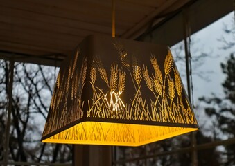Pendant lamp with a pattern in a cafe