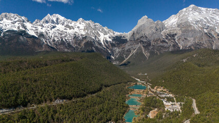 Aerial view of Jade Dragon Snow Mountain (or MtYulong) seen from blue moon valley scenic area in...