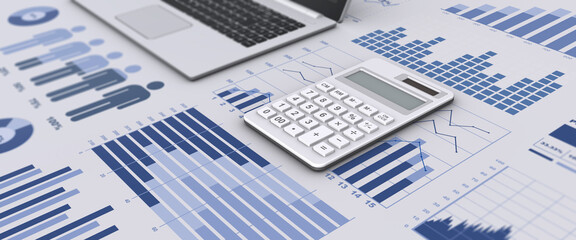 ビジネスグラフと電卓とノートパソコン、ビジネスデータの検討イメージ