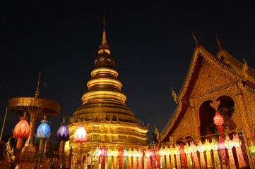 Night time of Hundred Thousand Lantern Festival at Wat Phra That Hariphunchai. It is an offering of...