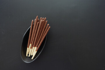 almond nut dark chocolate stick on table 