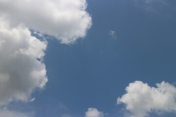 blue sky and white clouds. Freshness of the new day. Bright blue background.
