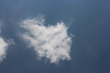 blue sky and white clouds. Freshness of the new day. Bright blue background.