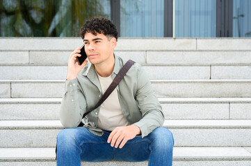 young man talking on smartphone