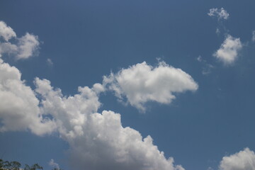 Blue sky and clouds background.