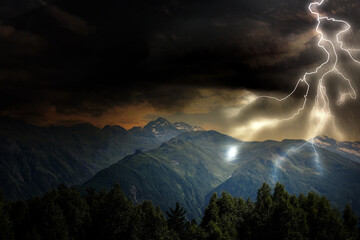 Thunder cloud with lightnings over mountains. Severe weather