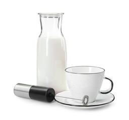 Mini mixer (milk frother), cup and bottle isolated on white