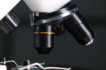 One microscope on dark background, closeup view
