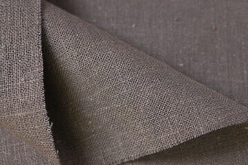 drak brown hemp viscose natural fabric cloth color, sackcloth rough texture of textile fashion...