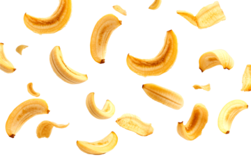 Banana chips slices isolated on a transparent background. Flying banana