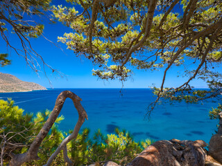 Fototapeta premium Looking over a sea from a hilltop (Spinalonga Island, Crete, Greece)
