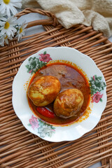 Hard boiled eggs curry or locally known in Malaysia as Kari Telur Rebus.
