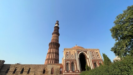 The Qutub Minar at Delhi India.Tallest minaret in the world closeup with selective focus and blur