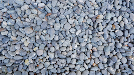 An Arrangement Of Pebbles That Form A Dense And Irregular Pattern