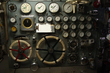 Ship engine room control equipment with manometers, switches and other machinery