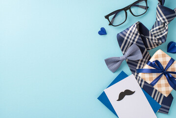 A stylish arrangement of Father's Day gifts featuring various ties, glasses, and decorative hearts...