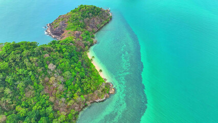 A breathtaking bird's-eye view of a stunning tropical sea paradise, where crystal-clear waters meet...